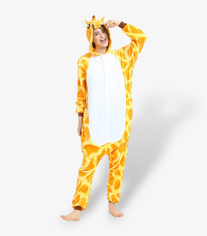 giraffe-onesie-for-adults-front-pose Woman posing playfully in the comfortable Giraffe Onesie for Adults featuring a vibrant yellow spotted pattern.