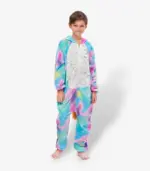 standing straight wearing a bright galaxy-patterned Unicorn Onesie for Kids against a light background.